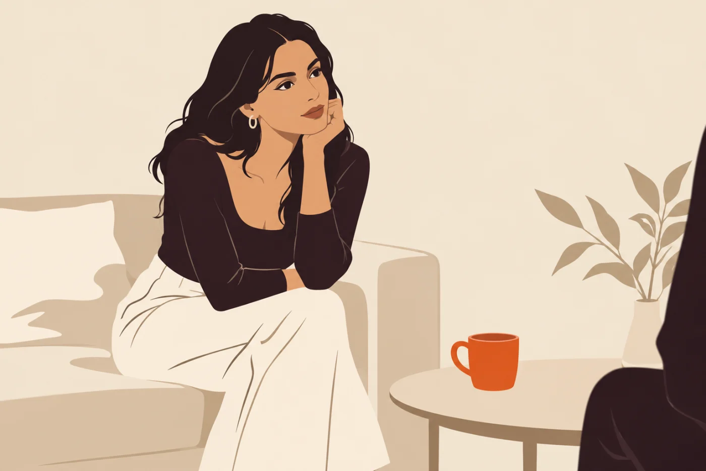 A woman leaning forward listening, a cold untouched mug on the table beside her